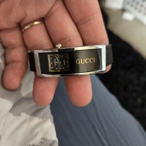 Gucci quartz silver and black watch.